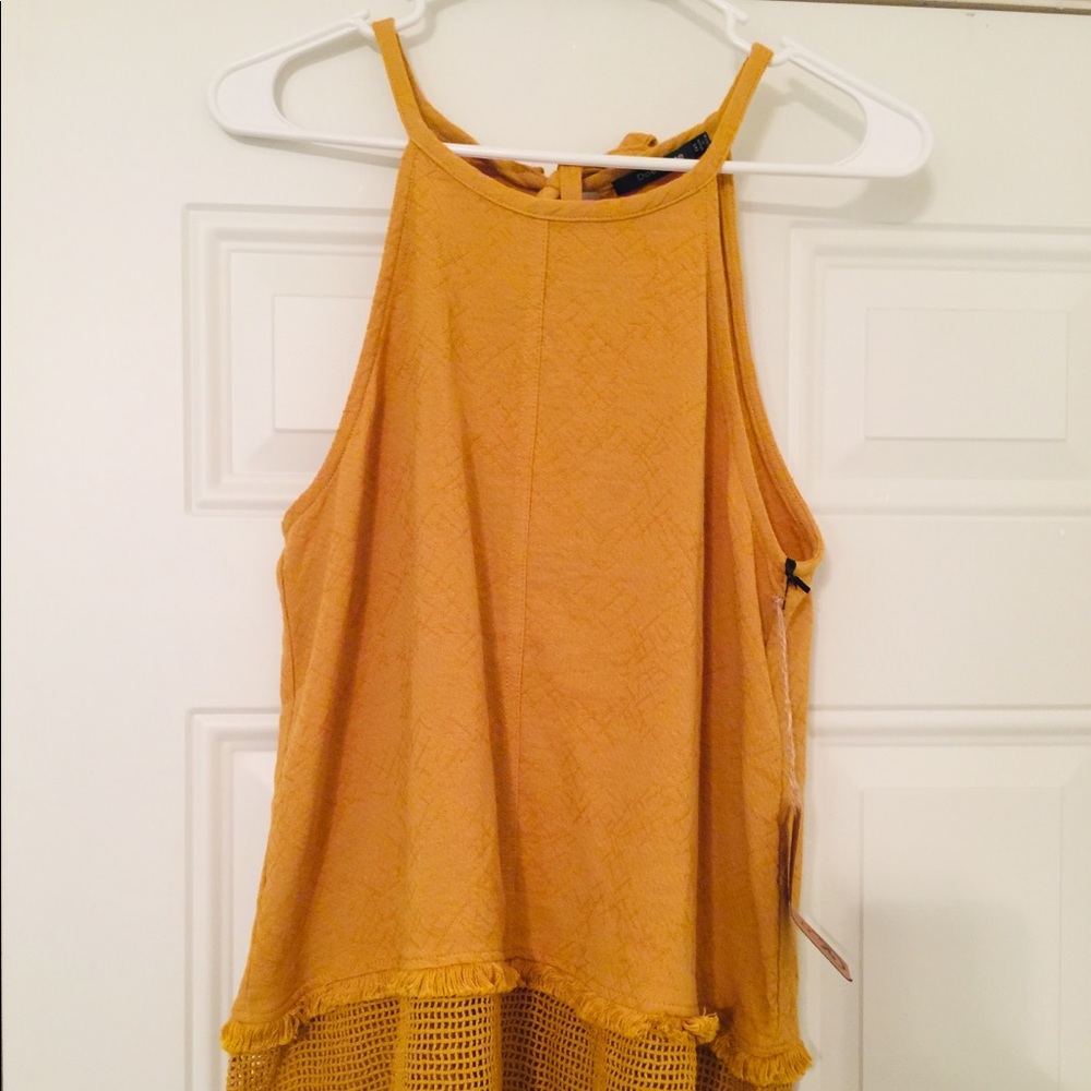 Yellow tank top.